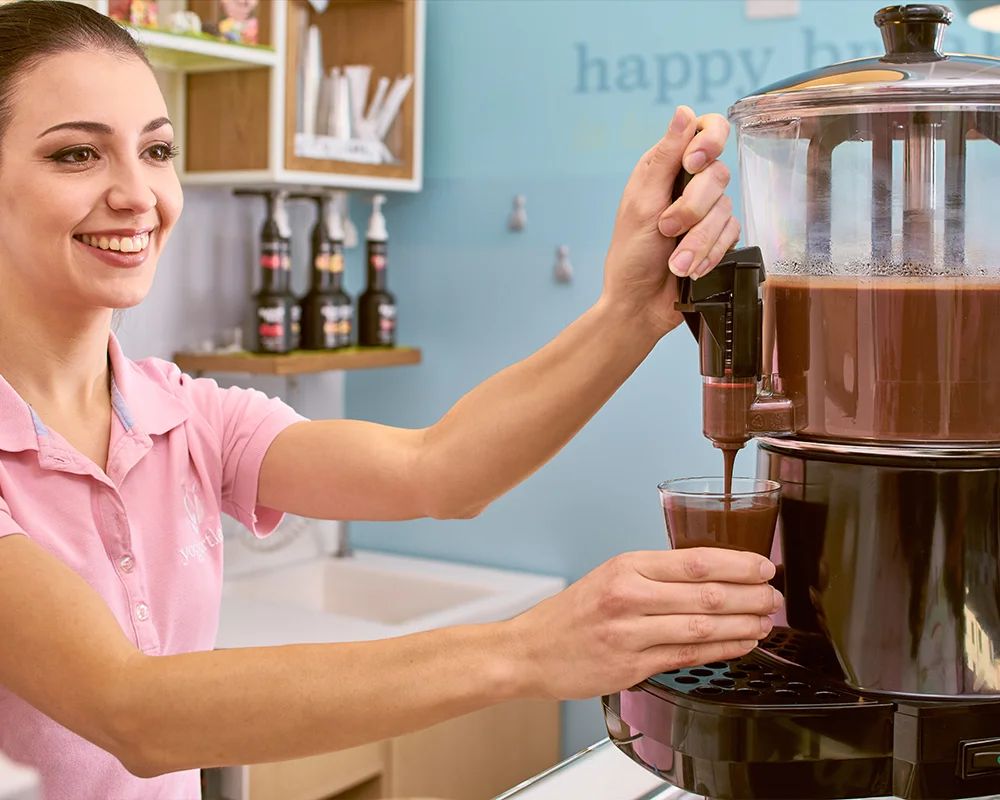 Hot-chocolate-dispensing-from-Lola-machine-SPM-1000x800