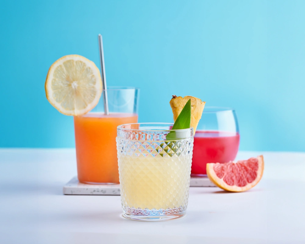 orange-juice-grapefruit-juice-and-pineapple-juice-in-glasses-SPM-1000x800
